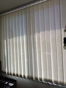 Cortinas verticales en Almagro, Caba. Tela Screen_beige